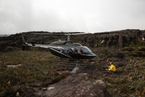 Helicopter's landing on the top of Auyantepui, near the base camp