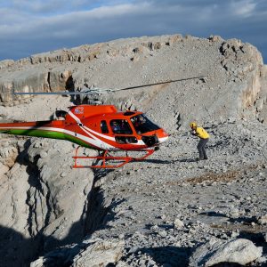 helicopter landing in dolomites